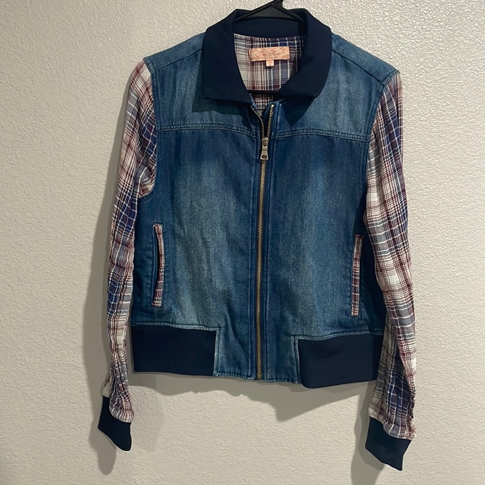 Free heart Jean jacket with platted sleeves.